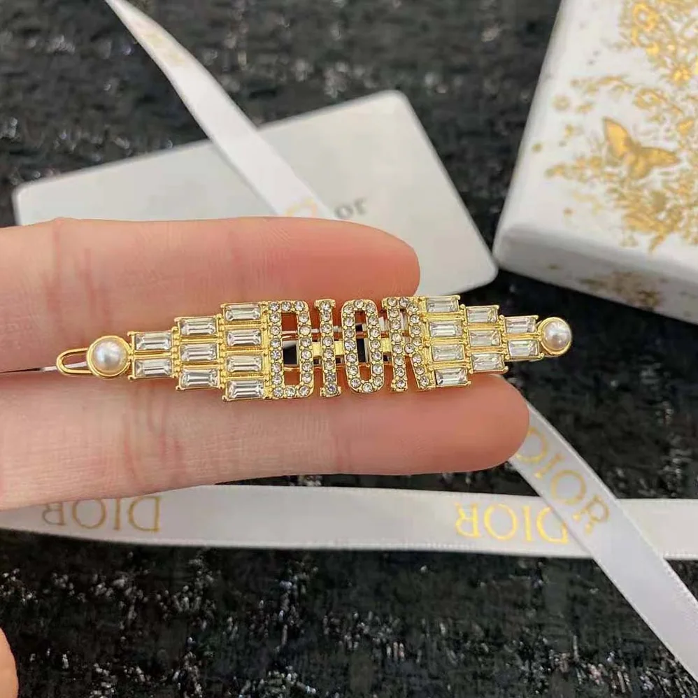 Dior Dio(r)evolution Barrette Gold-Finish Metal with White Crystals and White Resin Pearls for Women Dior Dio(r)evolution Barrette Gold-Finish Metal with White Crystals and White Resin Pearls for Women