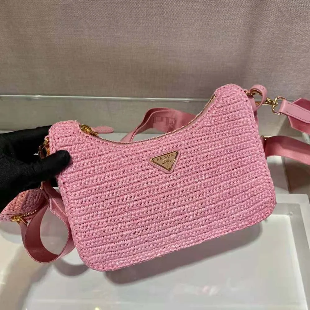 Prada Re-Edition 2005 Raffia Bag for Women in Pink Prada Re-Edition 2005 Raffia Bag for Women in Pink