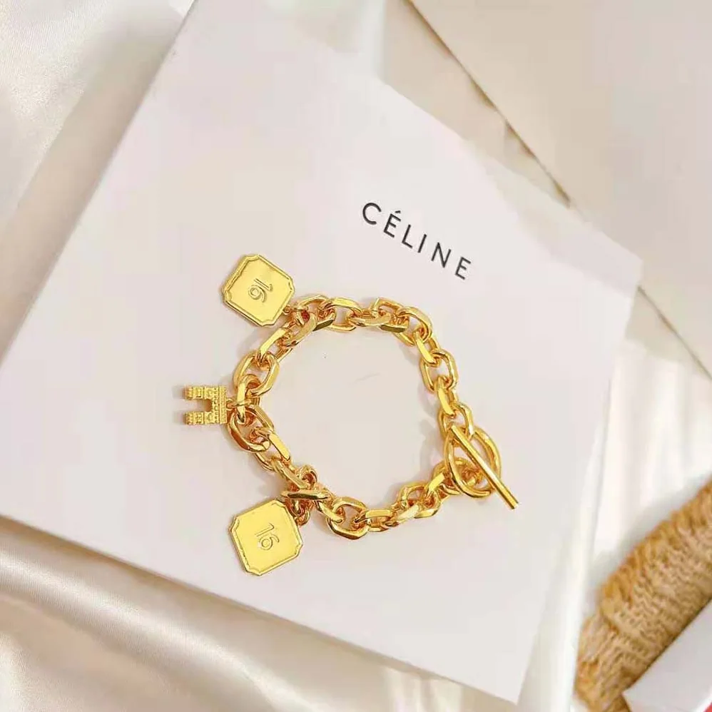 Celine Maillon Triomphe Charms Bracelet in Brass with Gold Finish for Women Celine Maillon Triomphe Charms Bracelet in Brass with Gold Finish for Women