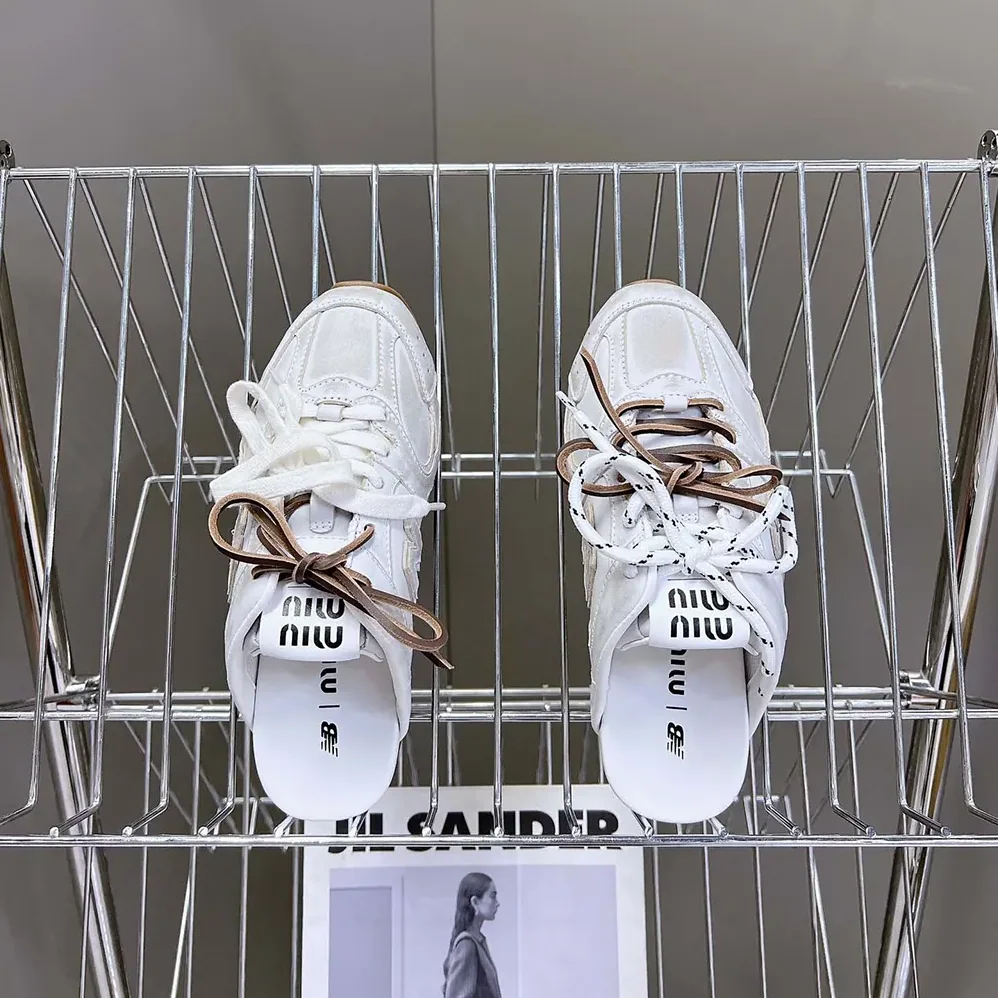 Miu Miu New Balance X Miu Miu 530 SL Deco Calf Leather Mules for Women in White Miu Miu New Balance X Miu Miu 530 SL Deco Calf Leather Mules for Women in White