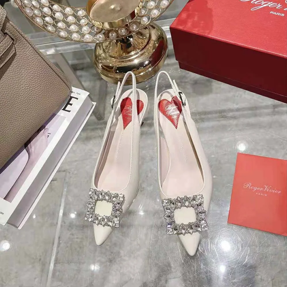 Roger Vivier Virgule Strass Buckle Slingback Pumps in Patent Leather for Women in White Roger Vivier Virgule Strass Buckle Slingback Pumps in Patent Leather for Women in White