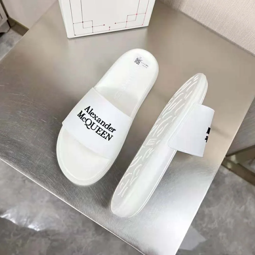 Alexander Mcqueen Pool Slide in White for Unisex in Black