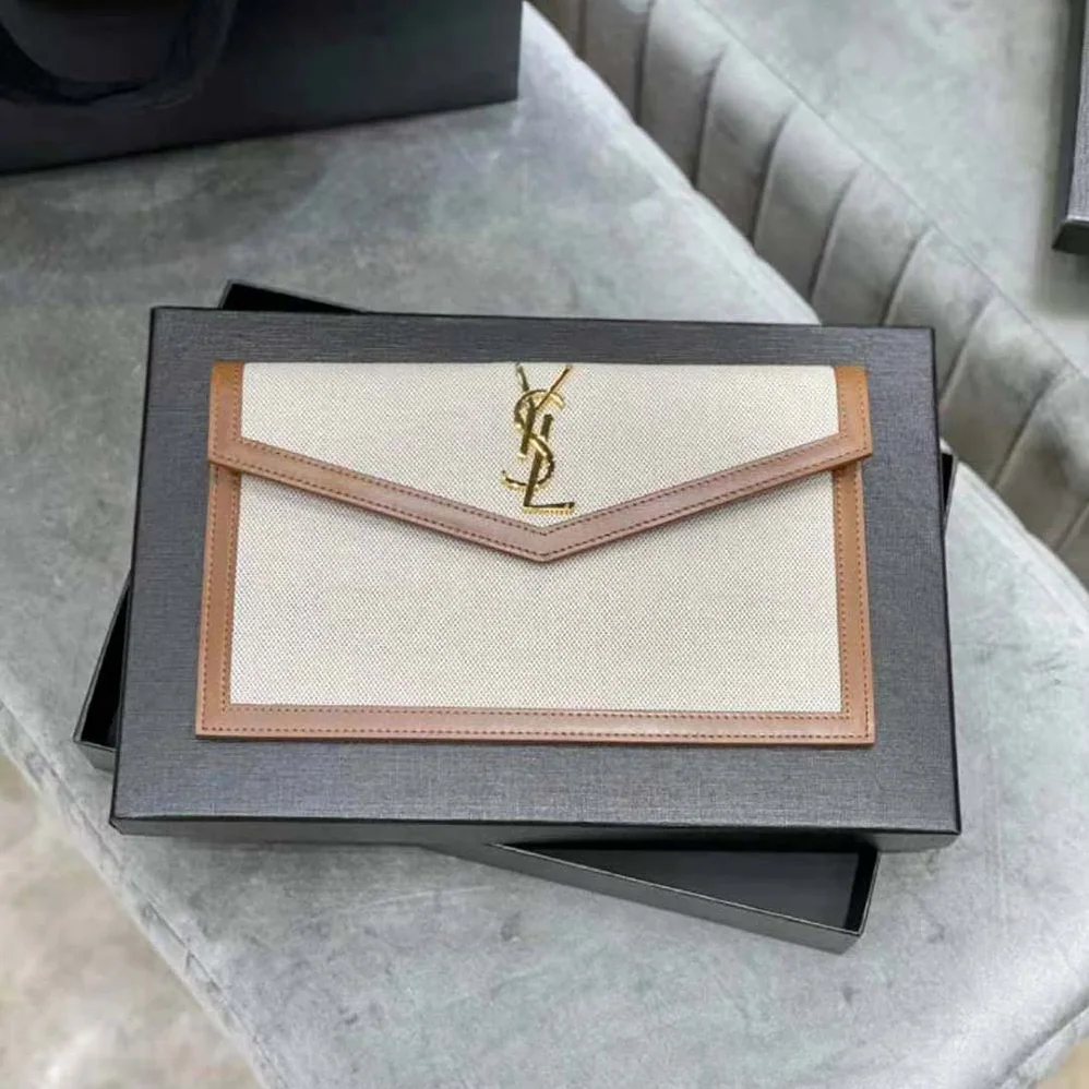 Saint Laurent YSL Uptown Pouch in Canvas and Smooth Leather for Women
