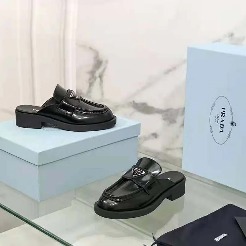 Prada Chocolate Brushed Leather Mules for Women in Black