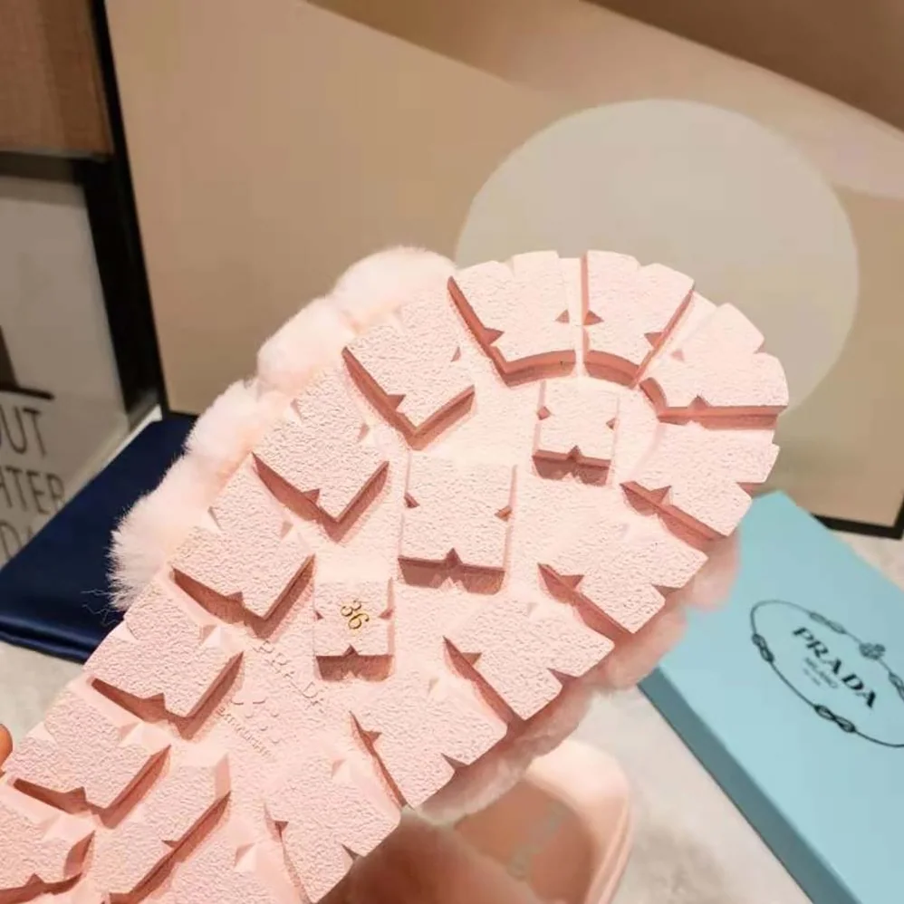 Prada Shearling Slides in 20mm Heel for Women in Pink Prada Shearling Slides in 20mm Heel for Women in Pink