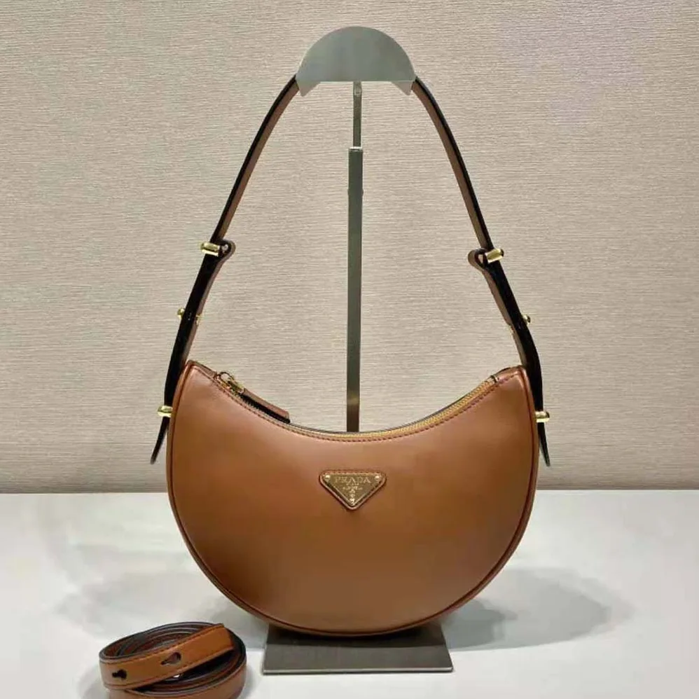 Prada Leather Shoulder Bag with Enameled Metal Triangle Logo for Women in Brown Prada Leather Shoulder Bag with Enameled Metal Triangle Logo for Women in Brown