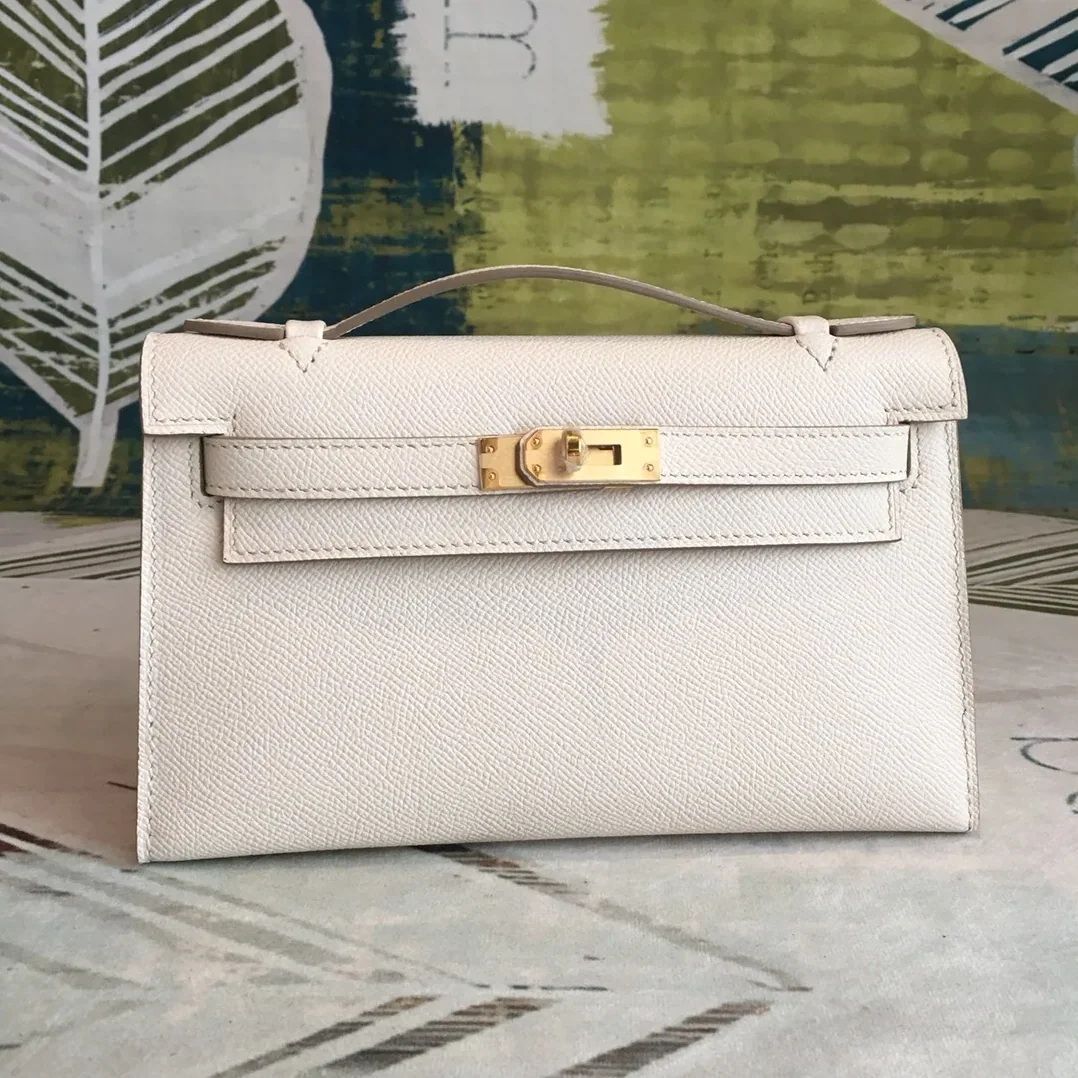 Hermes Kelly Pochettee White Gold Toned Hardware /