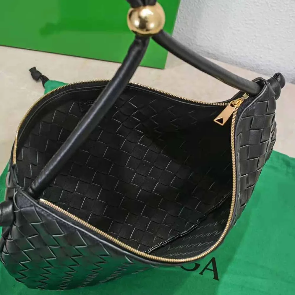 Bottega Veneta Turn Medium Intrecciato Leather Pouch with Adjustable Strap for Women in Black