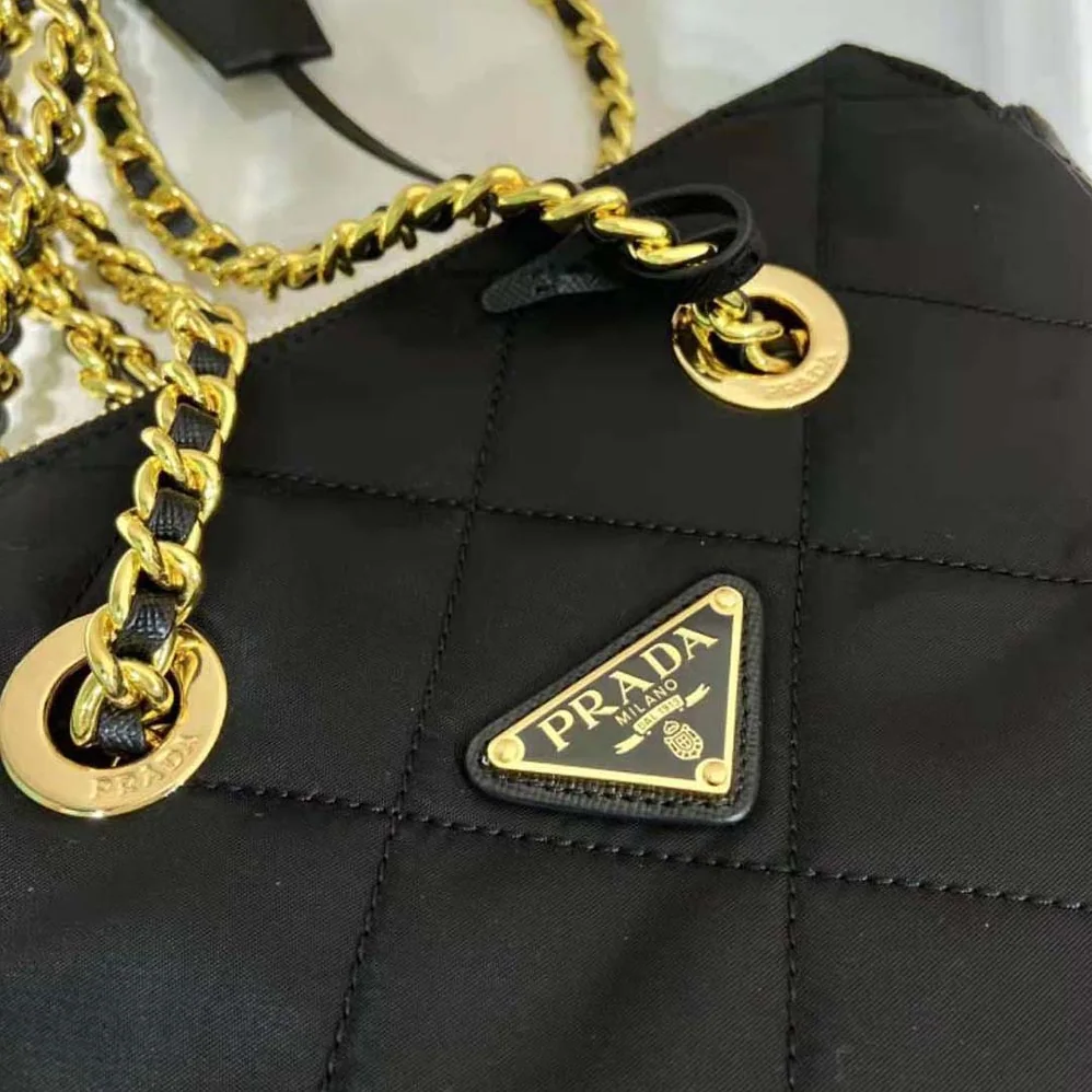 Prada Re-Edition 1995 Chaîne Re-Nylon Tote Bag for Women in Black Prada Re-Edition 1995 Chaîne Re-Nylon Tote Bag for Women in Black