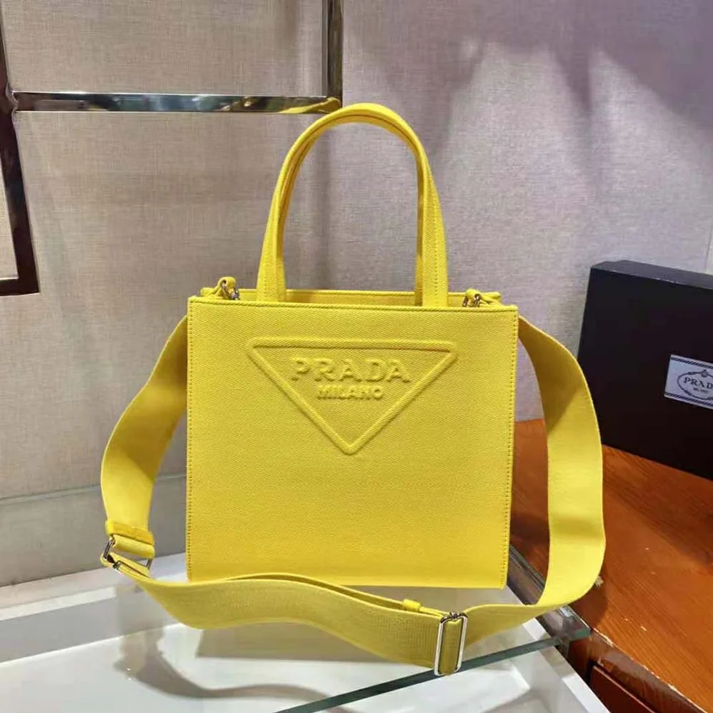 Prada Drill Tote Handles Bag for Women in Yellow Prada Drill Tote Handles Bag for Women in Yellow