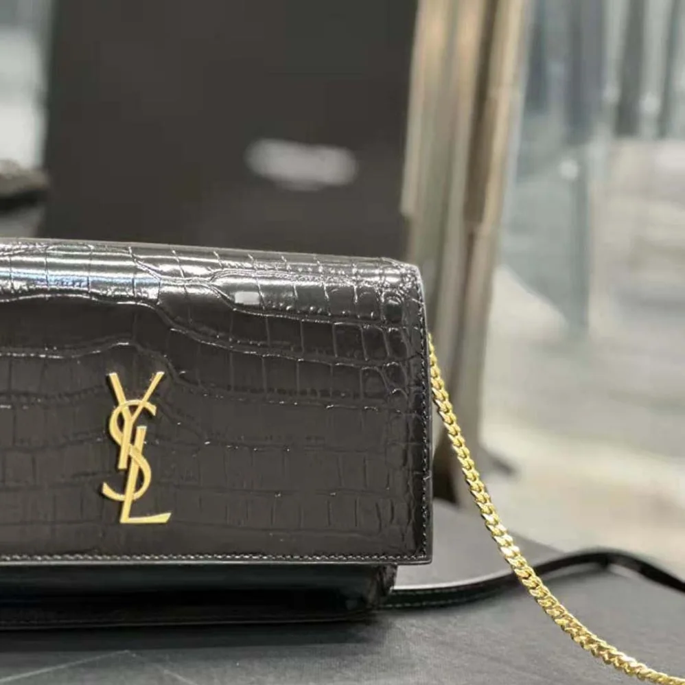 Saint Laurent YSL Cassandre Phone Holder with Strap in Shiny Crocodile-Embossed Leather for Women in Black Saint Laurent YSL Cassandre Phone Holder with Strap in Shiny Crocodile-Embossed Leather for Women in Black