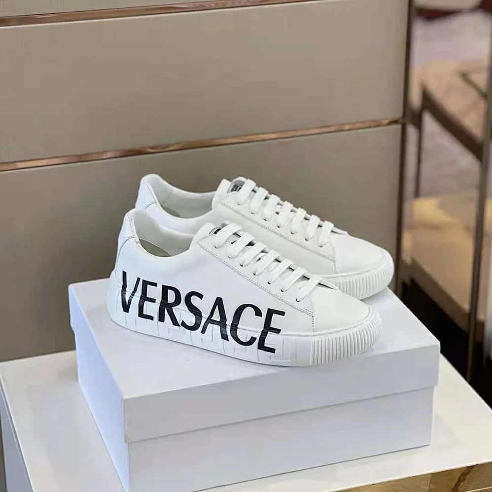 Versace Shoes Greca Logo Sneakers for Unisex in White Versace Shoes Greca Logo Sneakers for Unisex in White