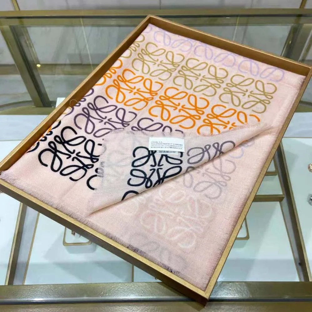 Loewe Anagram Lines Scarf in Wool and Cashmere for Women in White Loewe Anagram Lines Scarf in Wool and Cashmere for Women in White