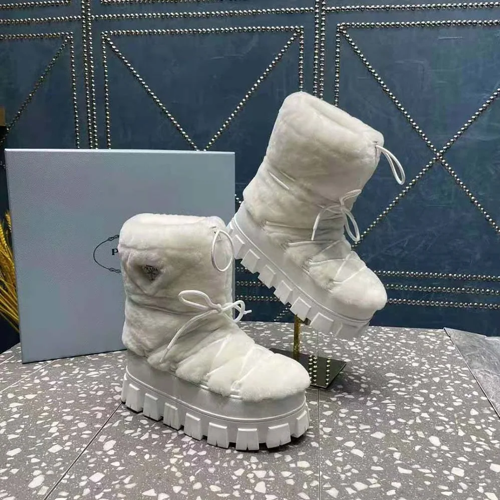Prada Shearling Apres-ski Boots for Women in White