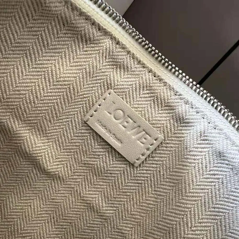 Loewe Mini Hammock Hobo Bag in Classic Calfskin for Women in White Loewe Mini Hammock Hobo Bag in Classic Calfskin for Women in White
