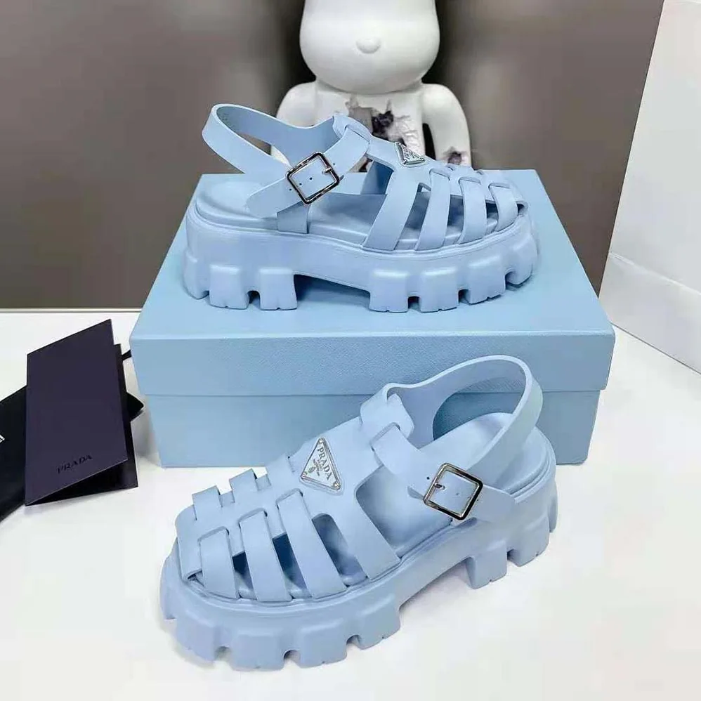 Prada Foam Rubber Sandals with Enameled Metal Triangle Logo for Women in Blue Prada Foam Rubber Sandals with Enameled Metal Triangle Logo for Women in Blue