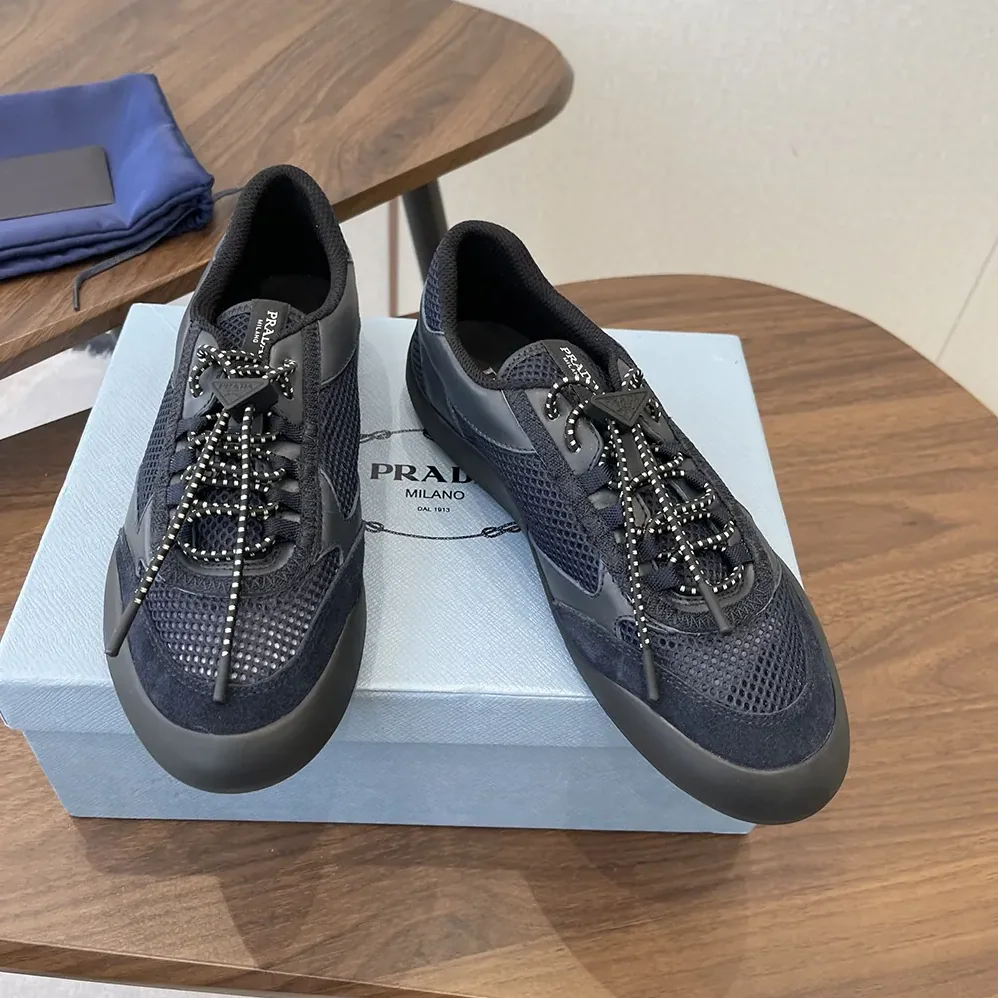 Prada Speedrock Leather And Mesh Fabric Sneakers for Unisex in Black