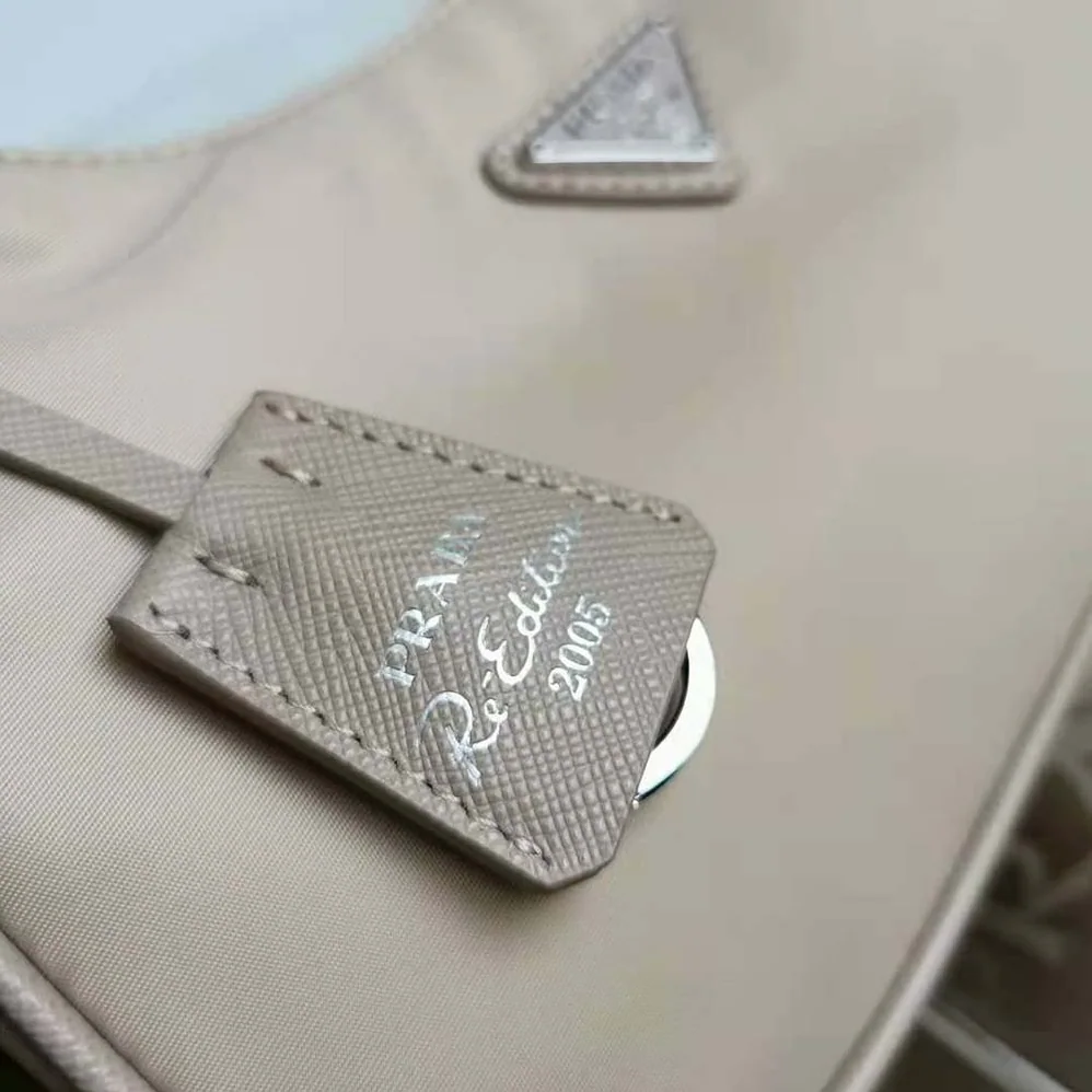 Prada Prada Re-Edition 2005 Nylon Bag for Women in Pink Prada Prada Re-Edition 2005 Nylon Bag for Women in Pink