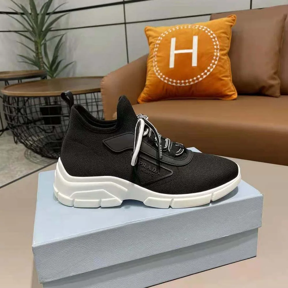 Prada The Triangle Logo Decorates These Knit Fabric Sneakers for Women in Black