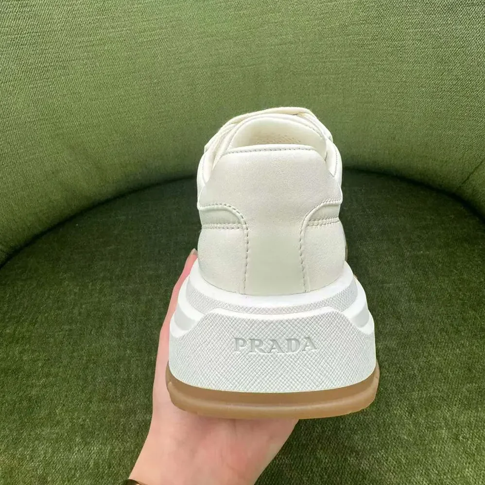 Prada Triangle Logo Leather Sneakers for Unisex in White