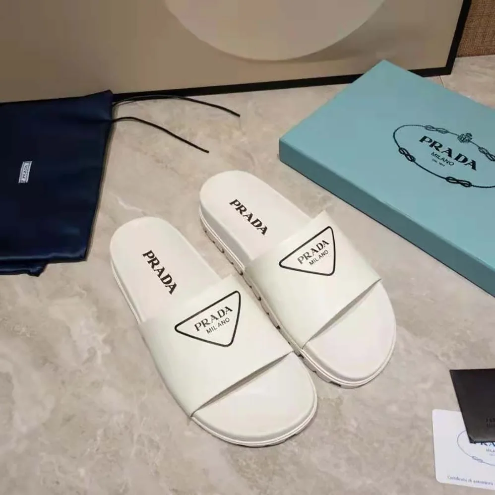 Prada Leather Slides in 20mm Heel for Women in White Prada Leather Slides in 20mm Heel for Women in White