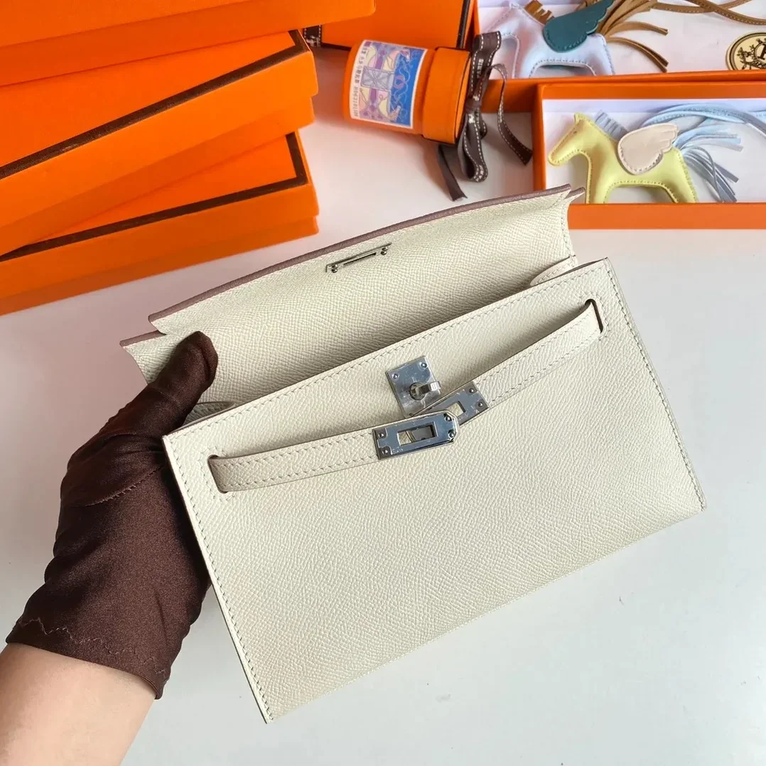 Hermes Kelly Pochette Top Handle Bag in Blanc Epsom Palladium Hardware