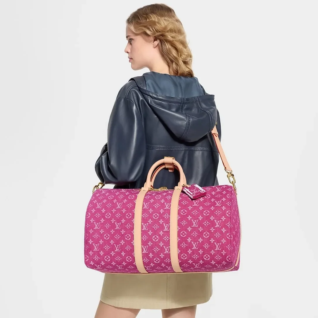 Louis Vuitton Keepall Bandouliere 45 Travel Bag in Fuchsia Denim Gold Hardware