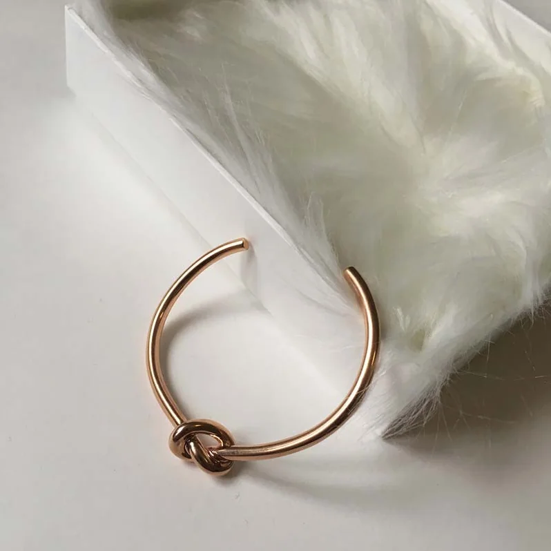 Celine Knot Extra-Thin Bracelet in Brass with Rhodium Finish for Women in Gold
