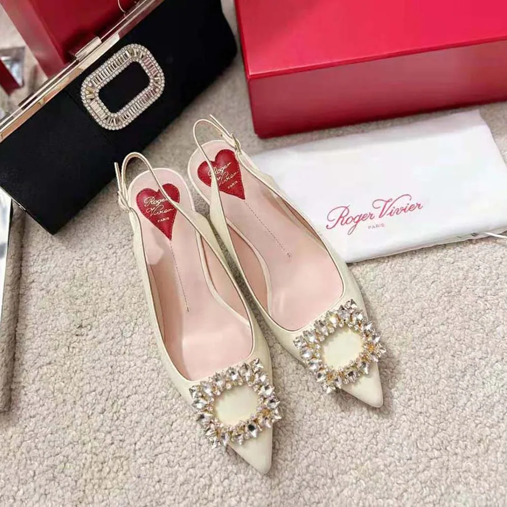 Roger Vivier Virgule Strass Buckle Slingback Pumps in Patent Leather for Women in White Roger Vivier Virgule Strass Buckle Slingback Pumps in Patent Leather for Women in White