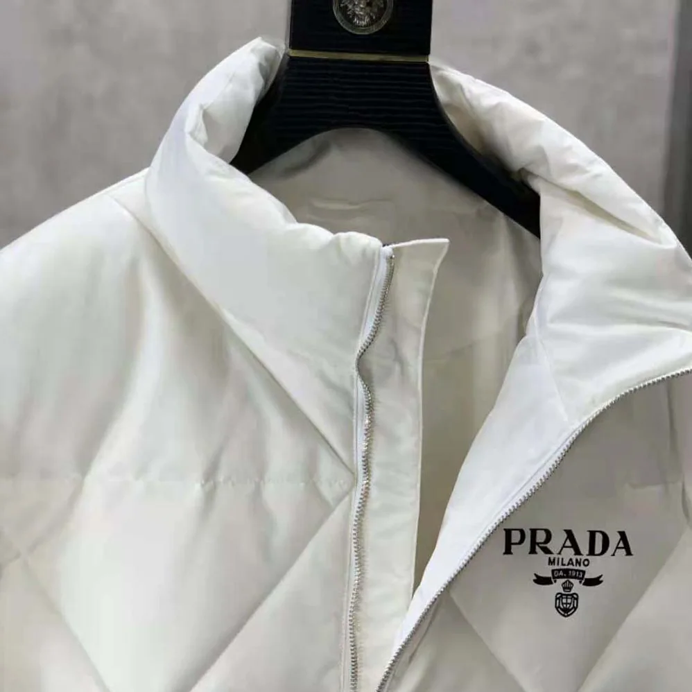 Prada Re-Nylon Down Jacket for Women in White Prada Re-Nylon Down Jacket for Women in White
