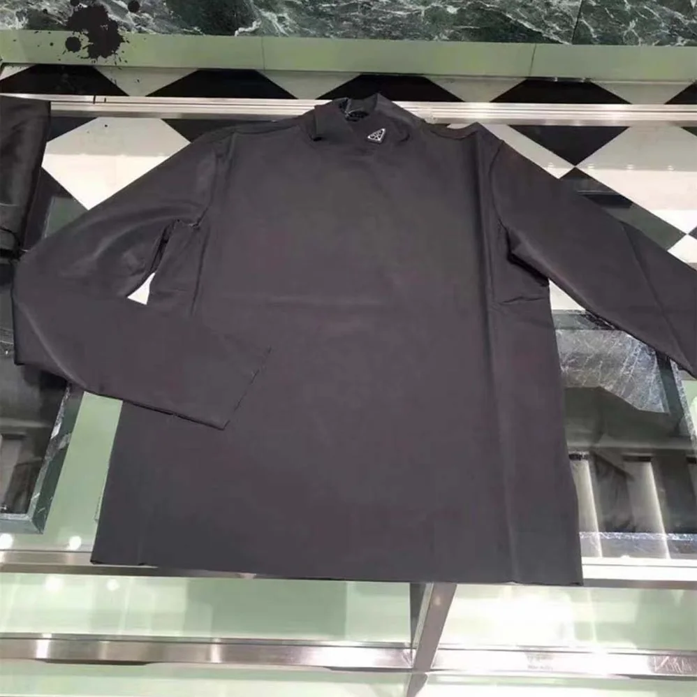 Prada Jersey Turtleneck Top for Women in Black Prada Jersey Turtleneck Top for Women in Black