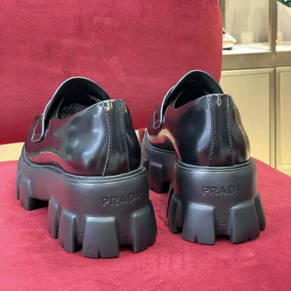 Prada Brushed Leather Monolith Loafers for Unisex in Black