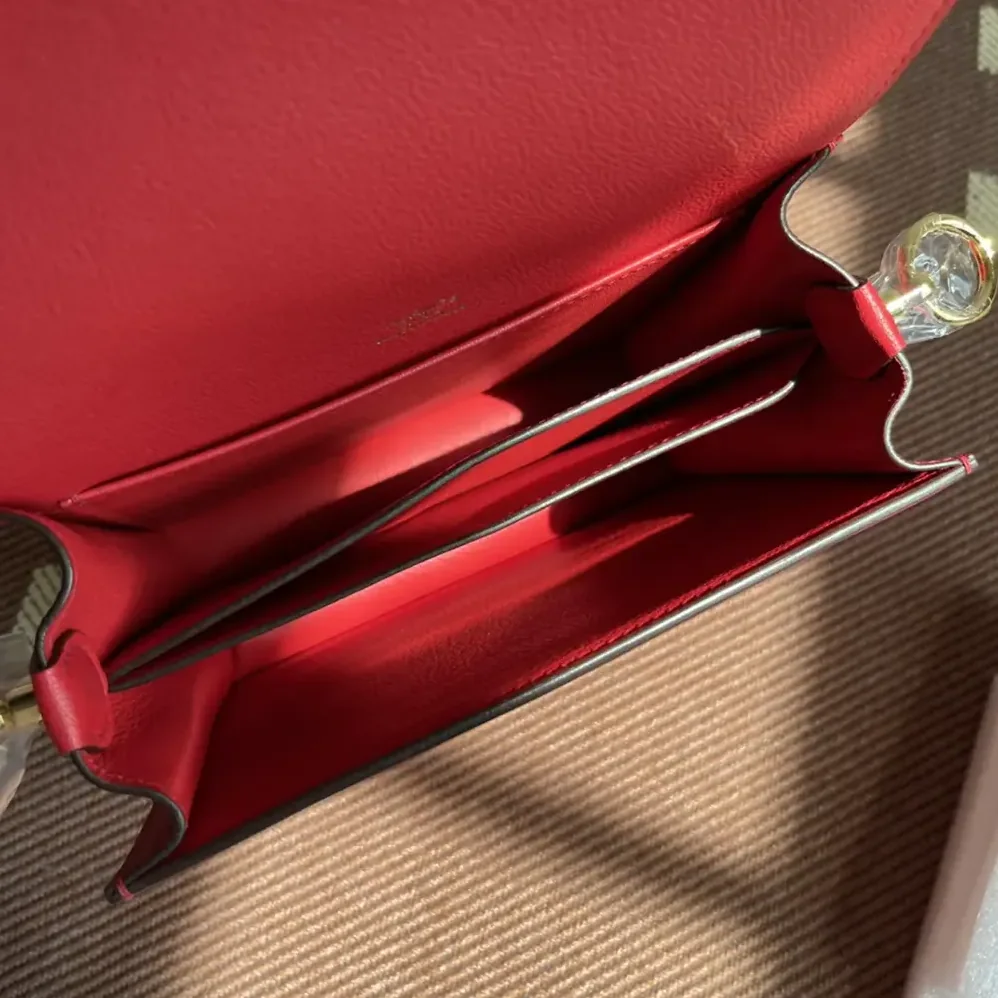 Hermes Roulis Mini Bag in Evercolor Calfskin for Women in Red/Gold