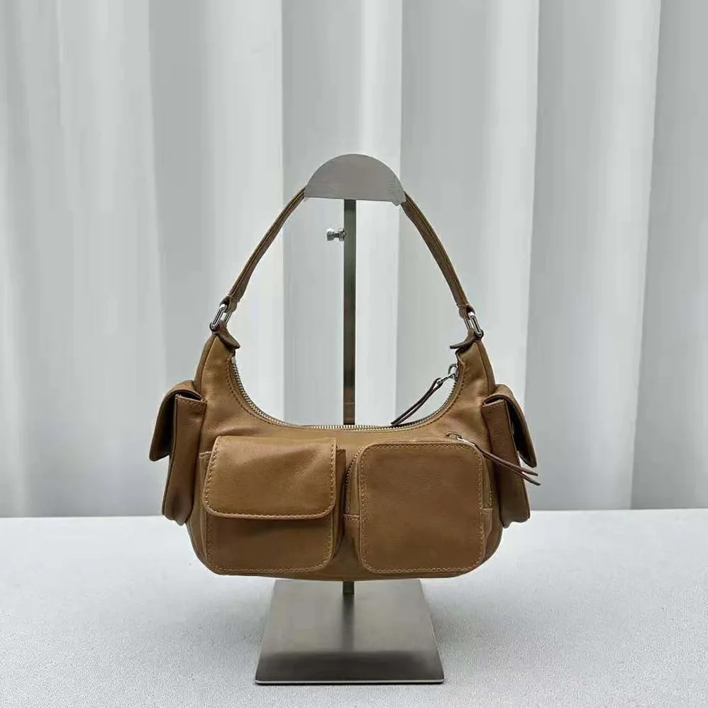 Miu Miu Pocket Nappa Leather Bag with Embossed Lettering Logo for Women in Brown Miu Miu Pocket Nappa Leather Bag with Embossed Lettering Logo for Women in Brown
