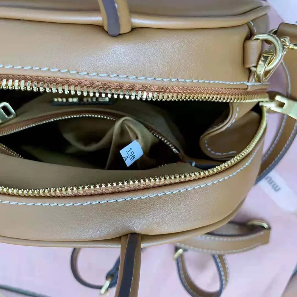 Miu Miu Medium Leather Top-handle Bag for Women in Brown