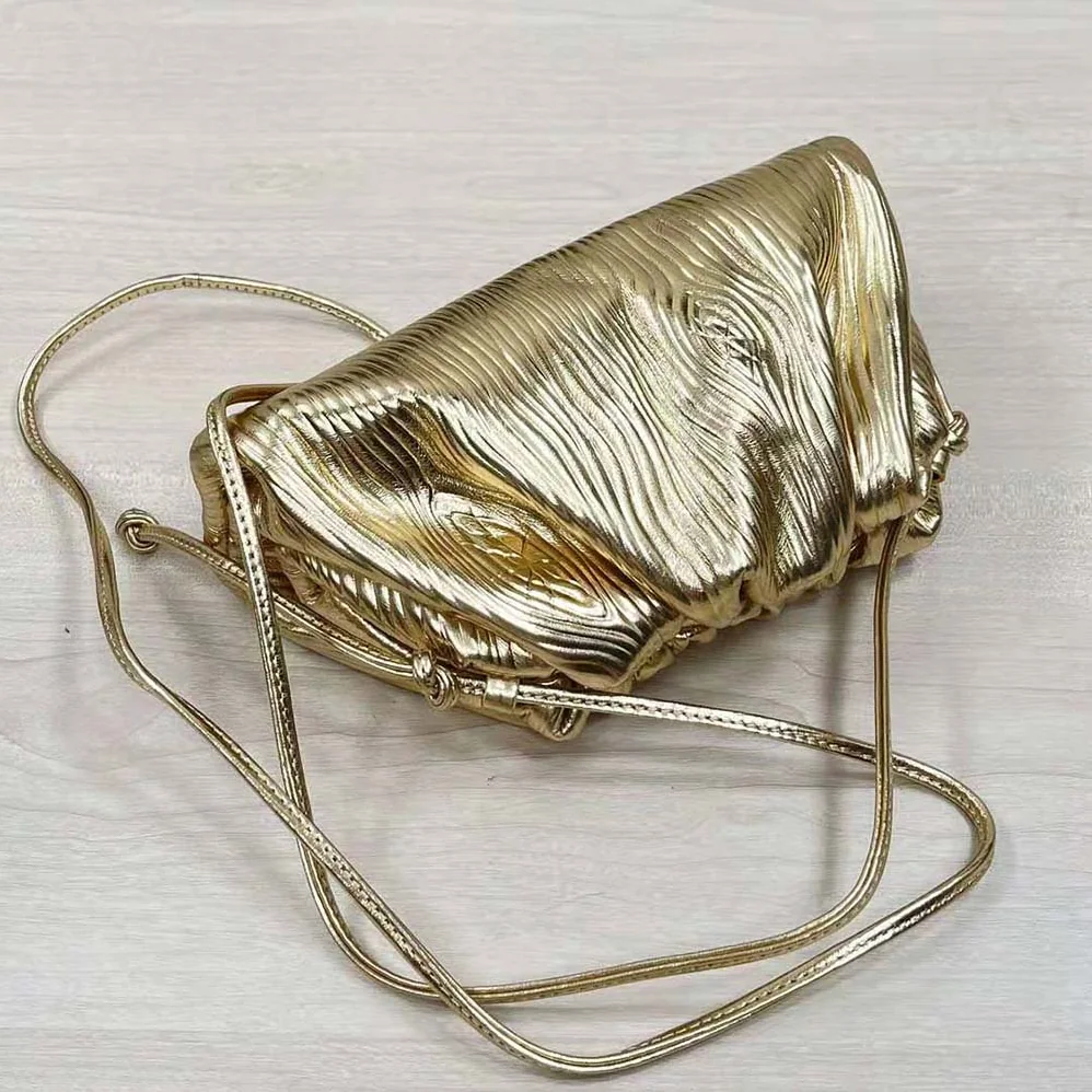 Bottega Veneta Pouch Metalized Leather Clutch for Women in Gold