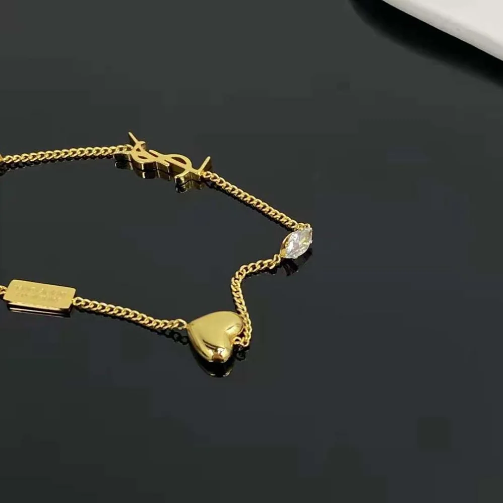 Saint Laurent YSL Opyum Heart Charm Bracelet in Metal for Women