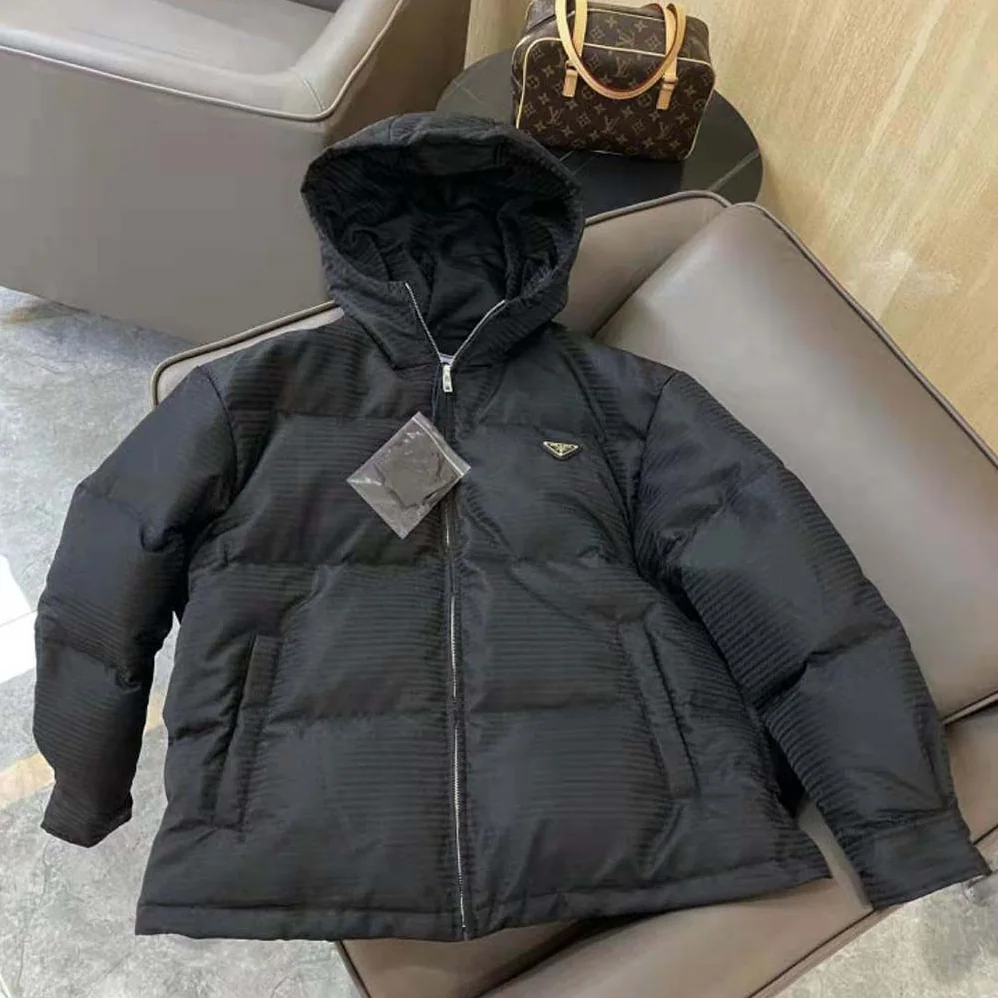Prada Re-Nylon Hooded Down Jacket for Men in Black Prada Re-Nylon Hooded Down Jacket for Men in Black