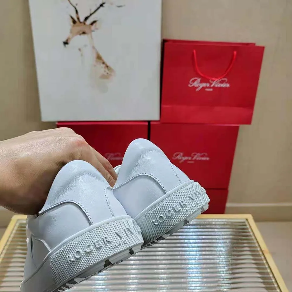 Roger Vivier Very Vivier Strass Buckle Sneakers in Leather for Women in White Roger Vivier Very Vivier Strass Buckle Sneakers in Leather for Women in White