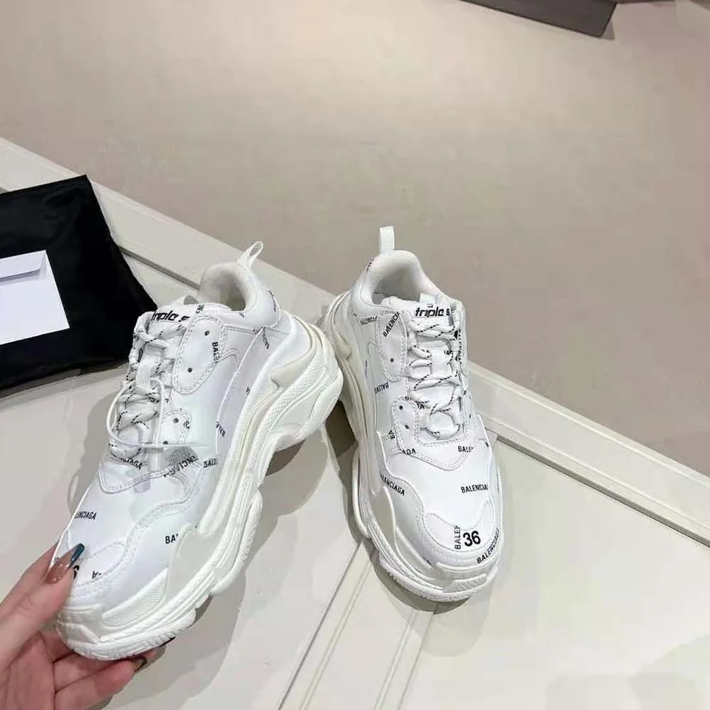 Balenciaga Triple S Sneaker Allover Logo in White and Black Technical Material for Unisex Balenciaga Triple S Sneaker Allover Logo in White and Black Technical Material for Unisex