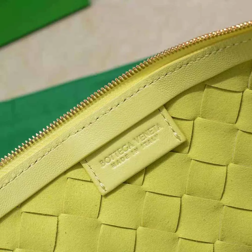 Bottega Veneta Turn Medium Intrecciato Leather Pouch with Adjustable Strap for Women in Yellow Bottega Veneta Turn Medium Intrecciato Leather Pouch with Adjustable Strap for Women in Yellow