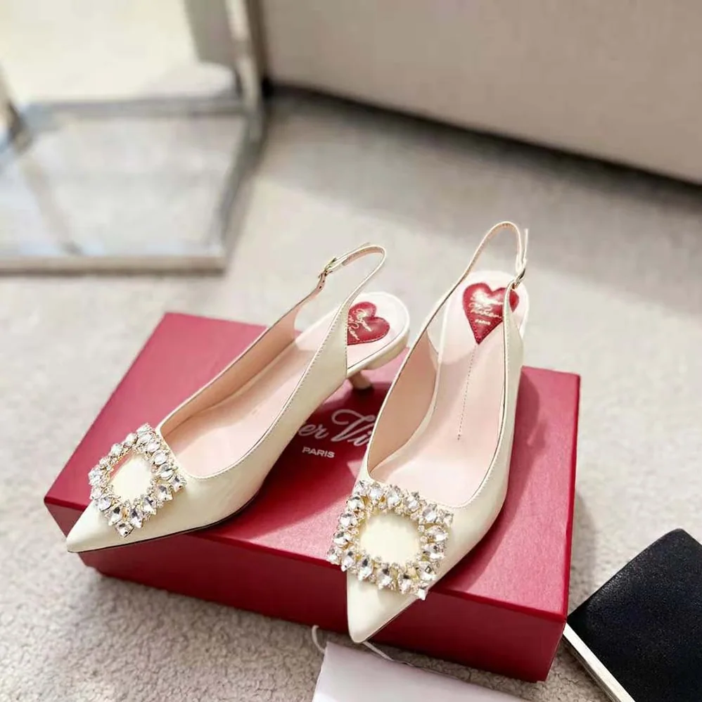 Roger Vivier Virgule Strass Buckle Slingback Pumps in Patent Leather for Women in White Roger Vivier Virgule Strass Buckle Slingback Pumps in Patent Leather for Women in White