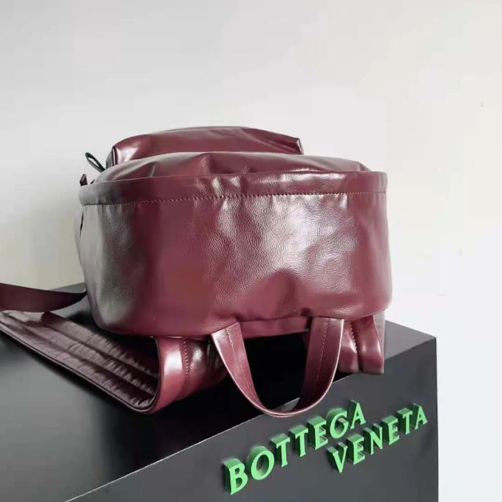 Bottega Veneta Medium Archetype Backpack Crafted from Supple Lambskin Leather for Men in Maroon