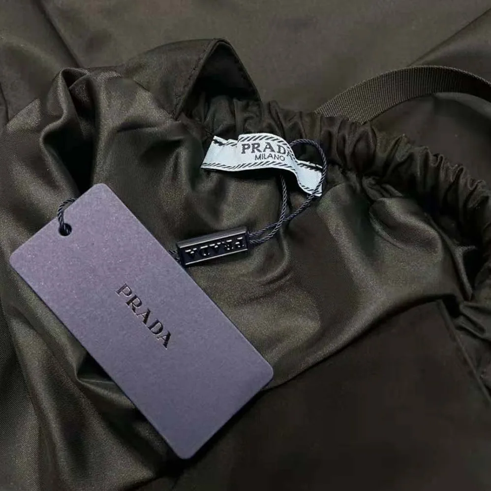 Prada Re-Nylon Gabardine Pinafore Dress for Women in Black Prada Re-Nylon Gabardine Pinafore Dress for Women in Black