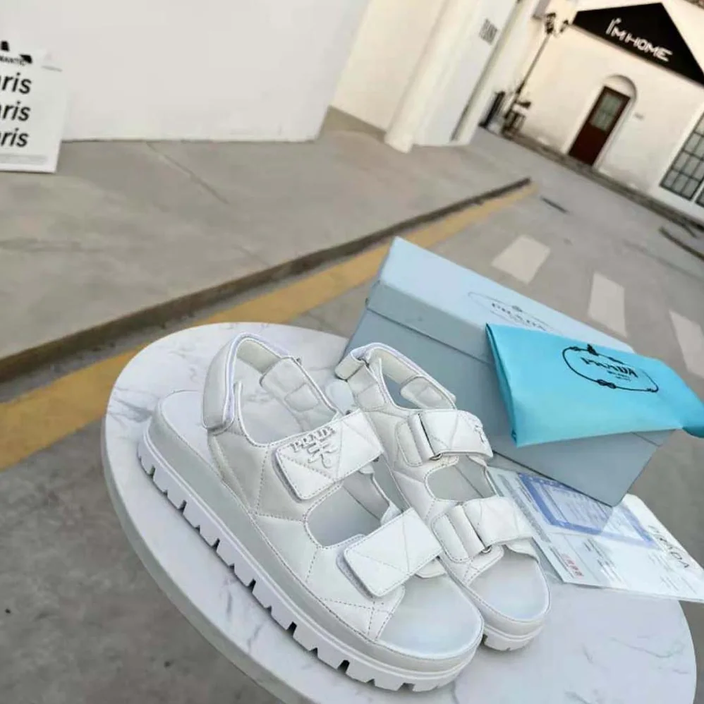 Prada Padded Nappa Leather Sandals for Women in White