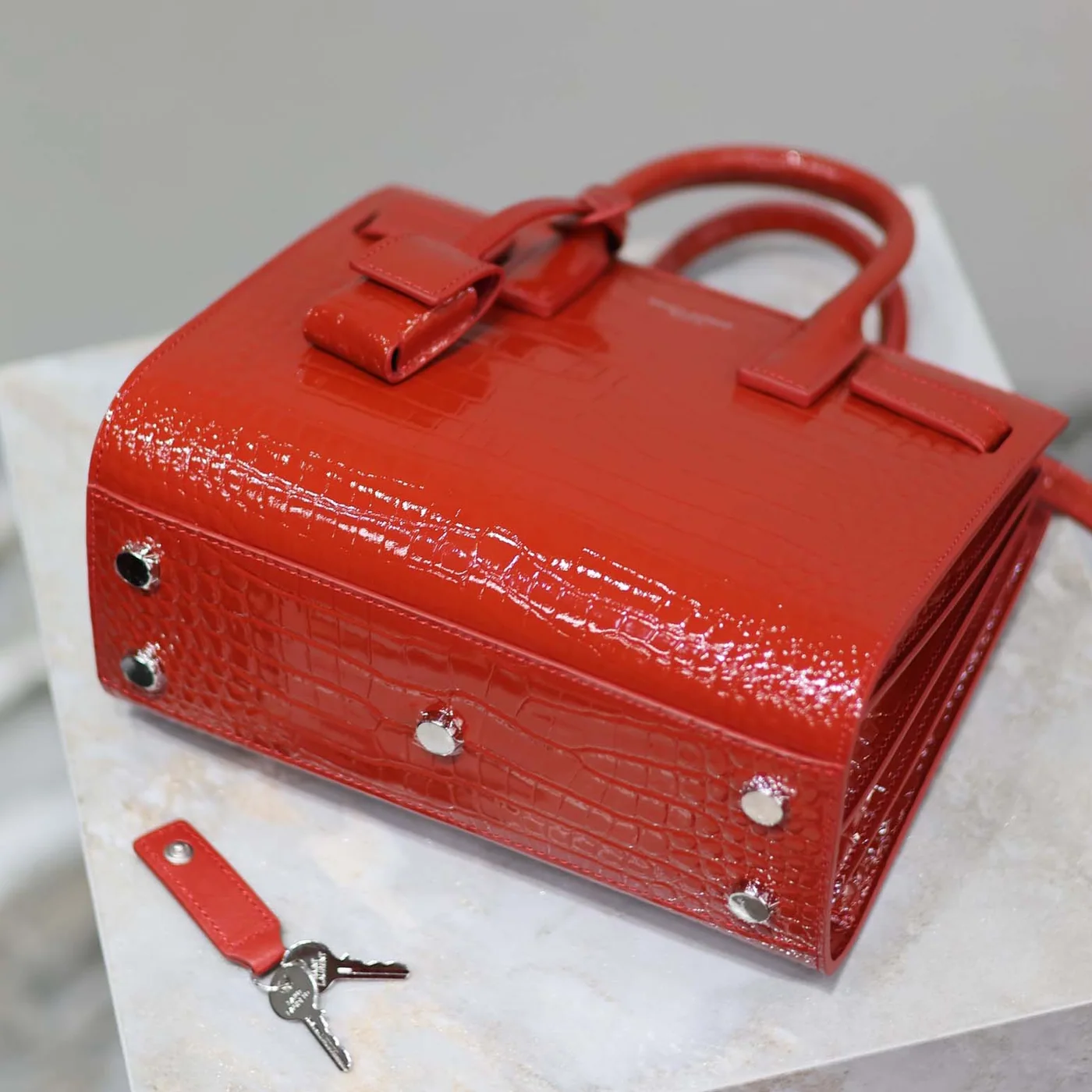 Saint Laurent YSL Sac De Jour in Crocodile Embossed Leather Nano for Women in Red Saint Laurent YSL Sac De Jour in Crocodile Embossed Leather Nano for Women in Red