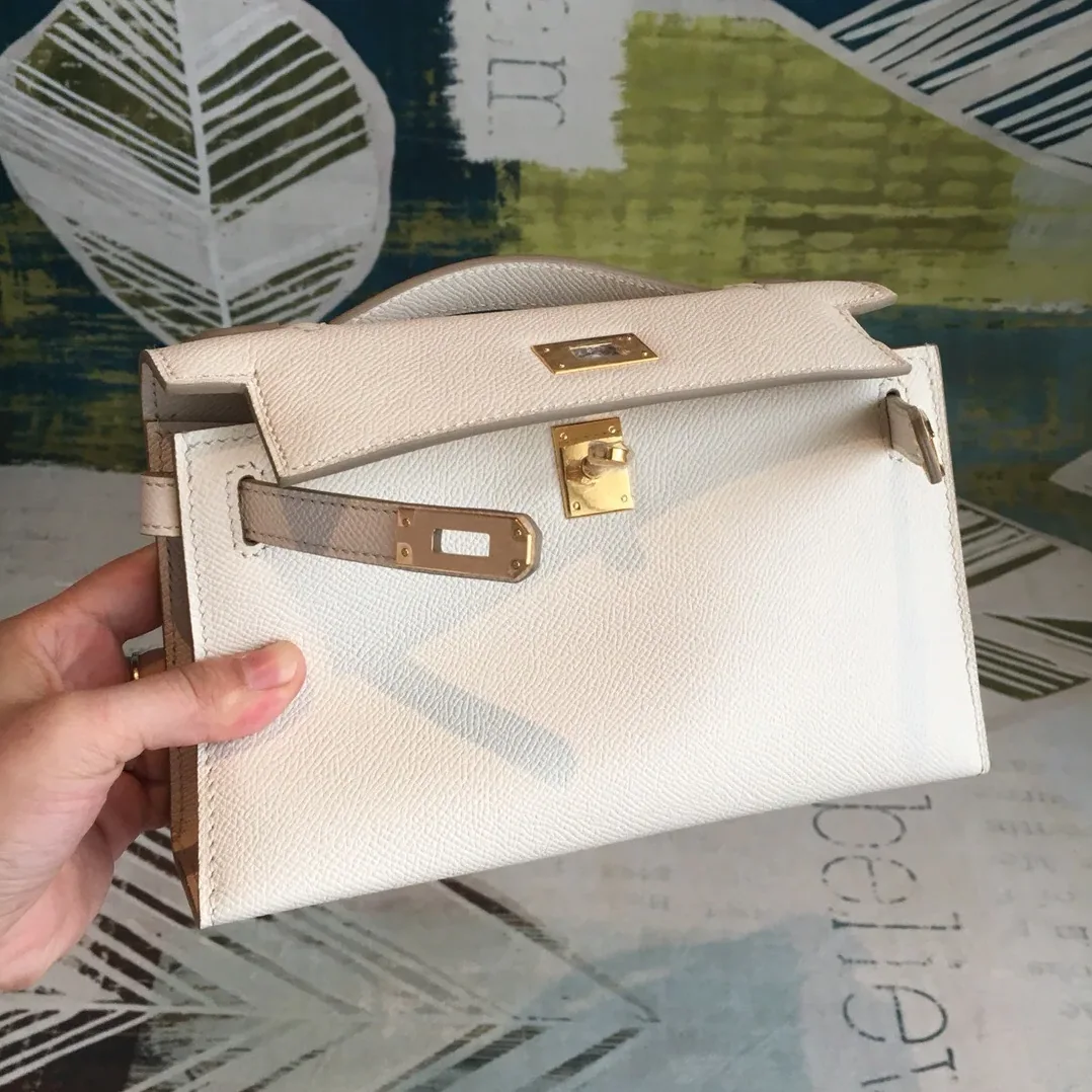 Hermes Kelly Pochettee White Gold Toned Hardware /