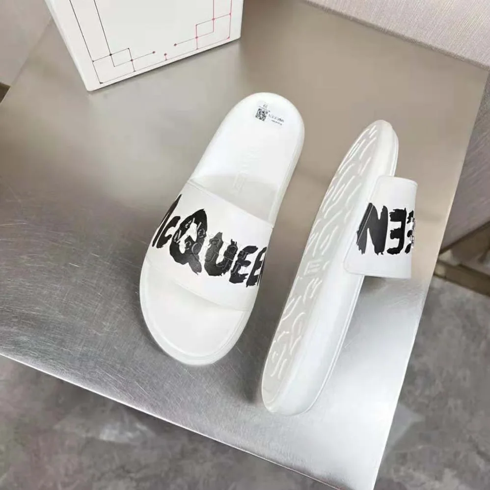 Alexander Mcqueen Oversized Rubber Slide in White for Unisex in Black Alexander Mcqueen Oversized Rubber Slide in White for Unisex in Black