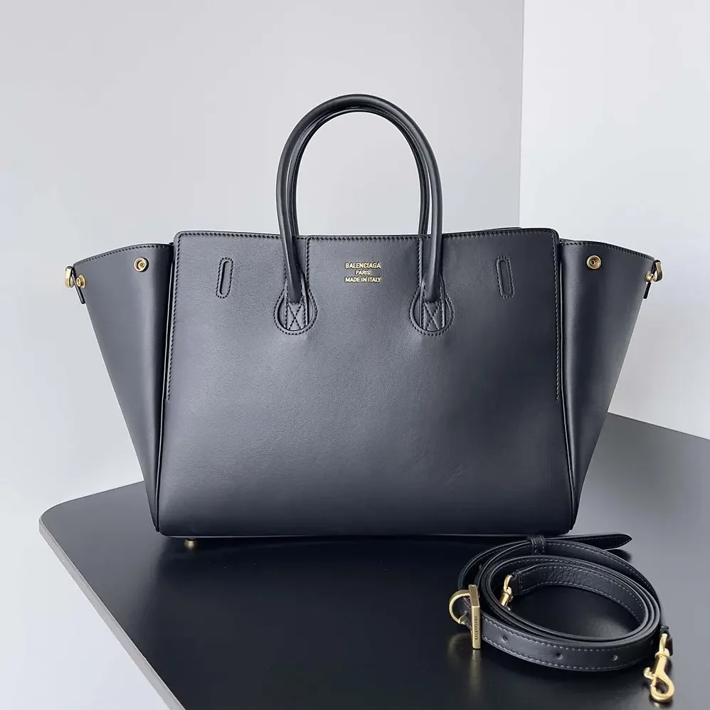 Balenciaga Bel Air Small Carry All Bag in Black Smooth Calfskin for Women in Gold Balenciaga Bel Air Small Carry All Bag in Black Smooth Calfskin for Women in Gold