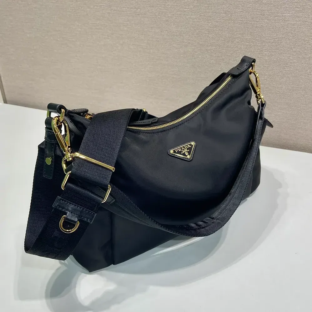Prada Explore Large Re-Nylon And Leather Bag for Women in Black Prada Explore Large Re-Nylon And Leather Bag for Women in Black
